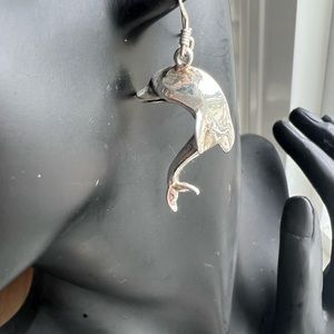 Hallmarked 925 silver set of dolphins earrings.